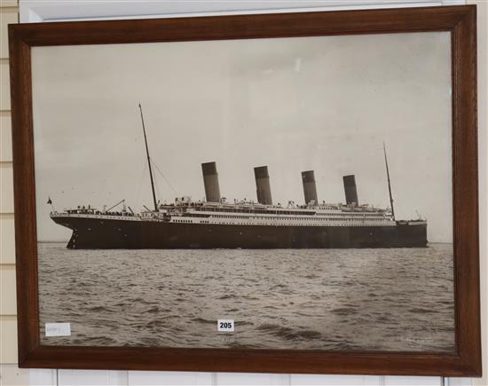 A large vintage photograph of the Titanic signed by Beken and Son Cowes 57 x 80cm